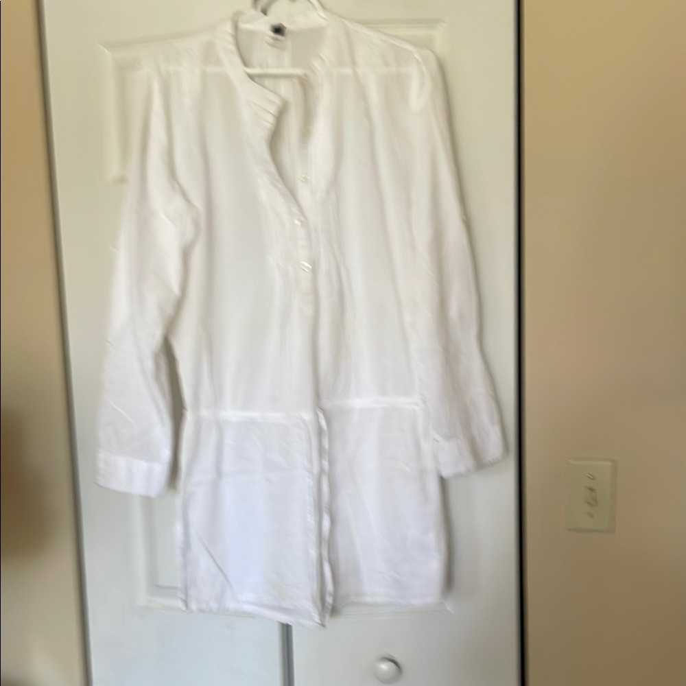 White Beach cover up. Size M. Button to waist. Long sleeve one button or rollup.